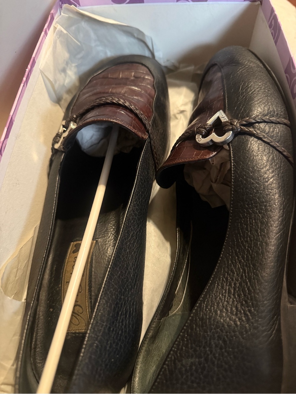 Brighton Colby Black and Brown Leather Slip-On Loafers with Metal Accent